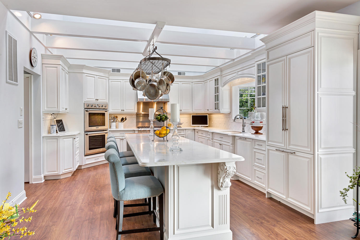 Design Line Kitchens in Avon, NJ offers a luxurious white kitchen that exudes elegance and sophistication. With sleek white cabinets, marble countertops, and top-of-the-line appliances, this kitchen is perfect for those who appreciate the finer things in life.