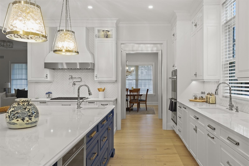 A design-forward space with luxury appliances, a w