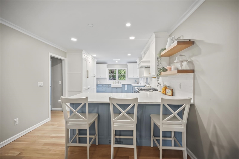 ramshorn drive renovation wall blue cabinetry