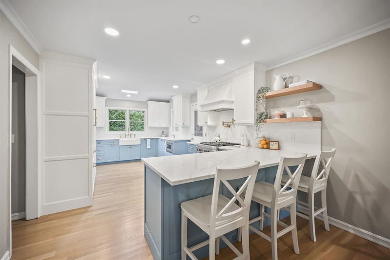 ramshorn drive renovation wall blue cabinetry