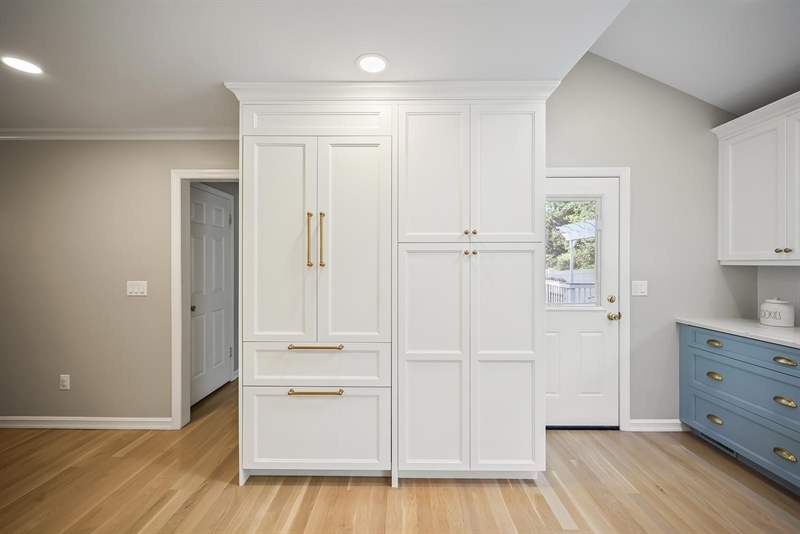 ramshorn drive renovation wall blue cabinetry