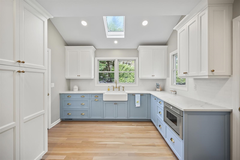 ramshorn drive renovation wall blue cabinetry