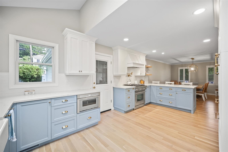 ramshorn drive renovation wall blue cabinetry