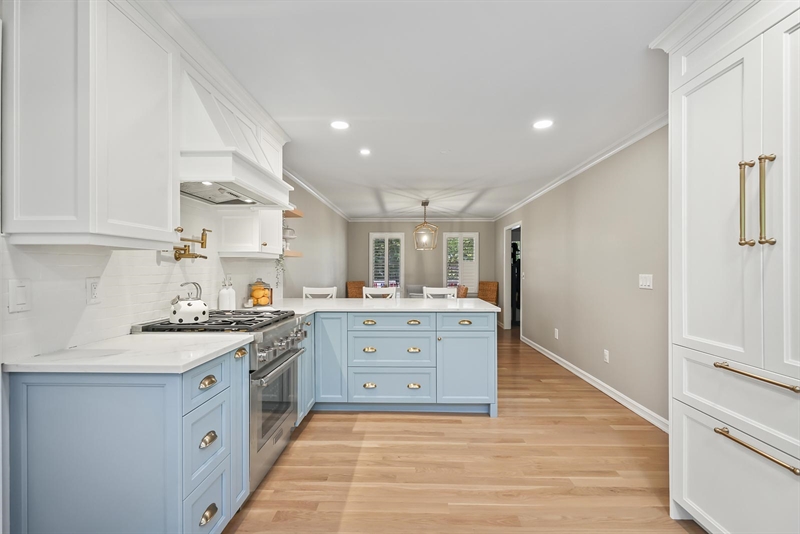 ramshorn drive renovation wall blue cabinetry