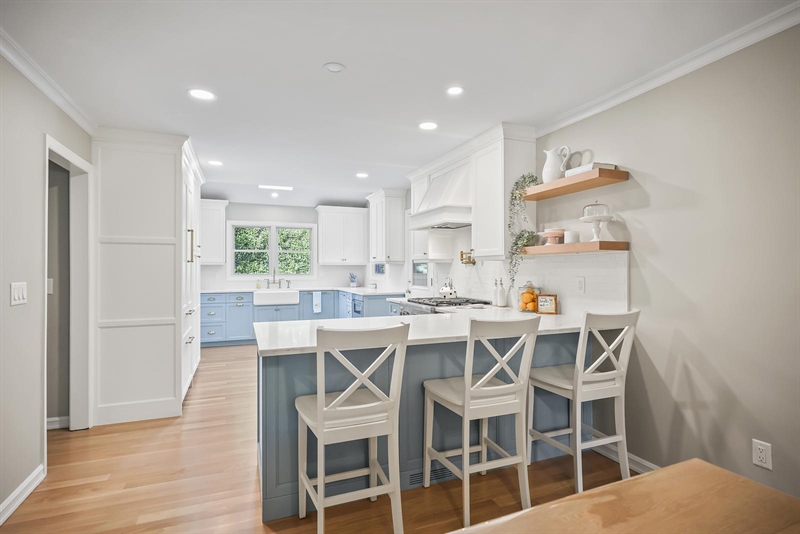 ramshorn drive renovation wall blue cabinetry