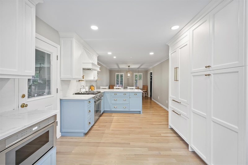 ramshorn drive renovation wall blue cabinetry